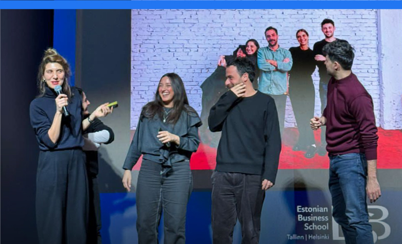 A group of people on stage
Description automatically generated