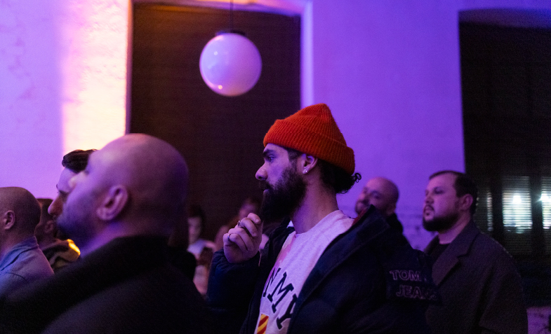 A person in a red hat
Description automatically generated