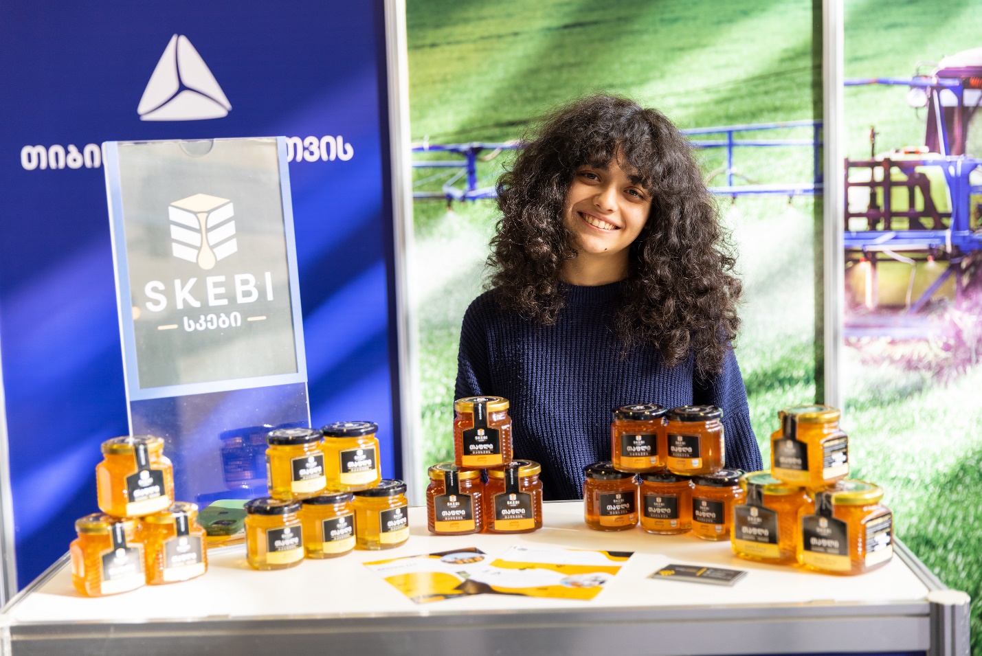 A picture containing text, person
Description automatically generated