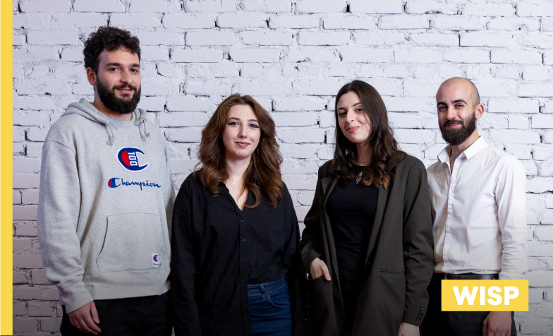 A group of people posing for a photo
Description automatically generated