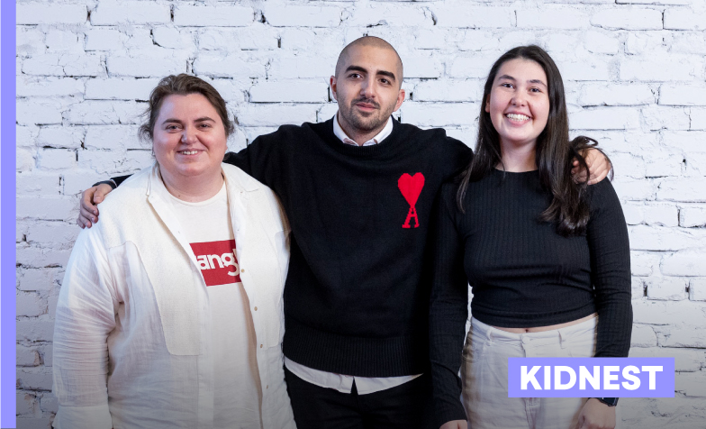 A group of people posing for a picture
Description automatically generated